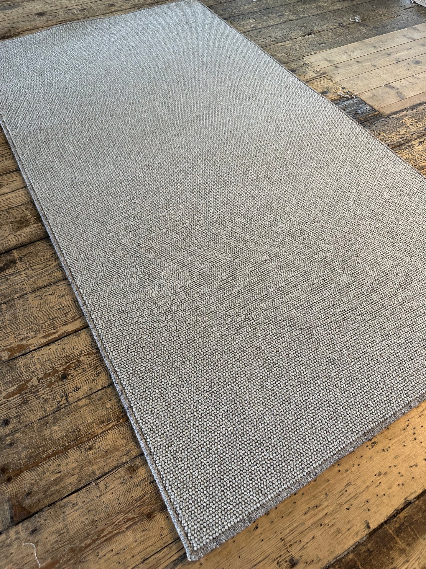 Pewter 100% wool small rug 114cm x 211cm