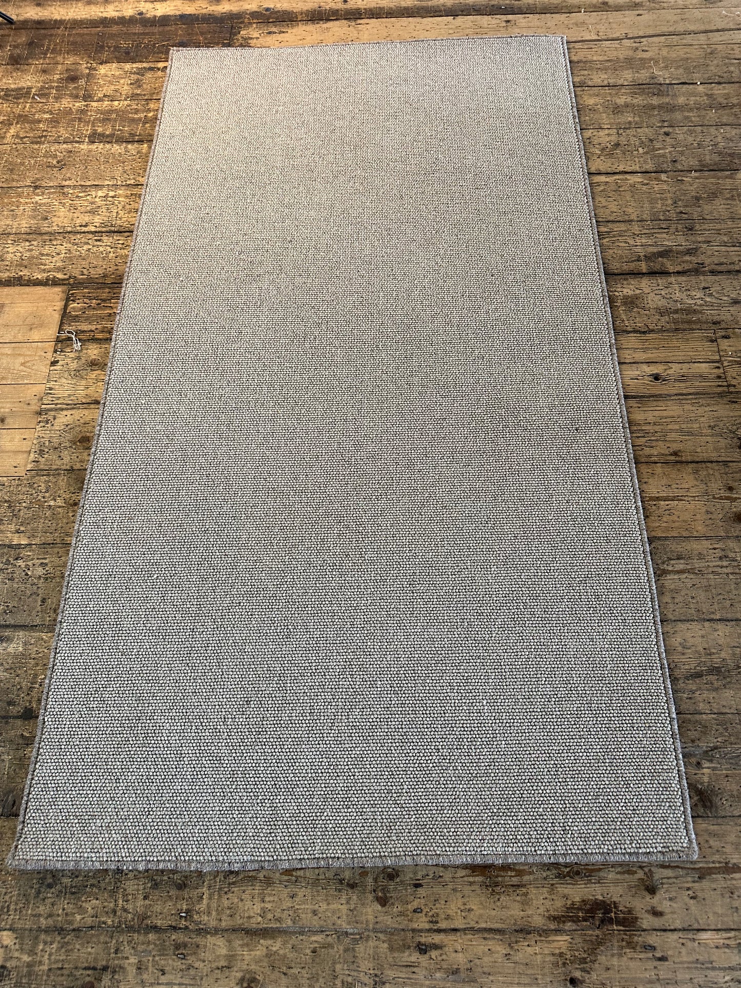 Pewter 100% wool small rug 114cm x 211cm
