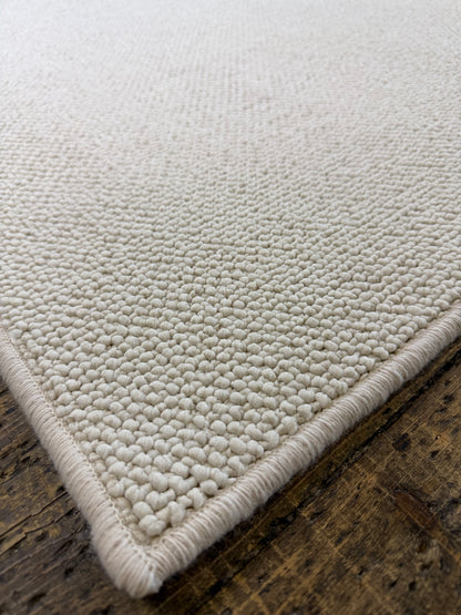 Pearled ivory 100% polypropylene rug 225cm x 357cm