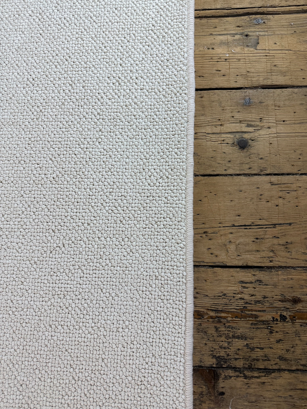 Pearled ivory 100% polypropylene rug 225cm x 357cm